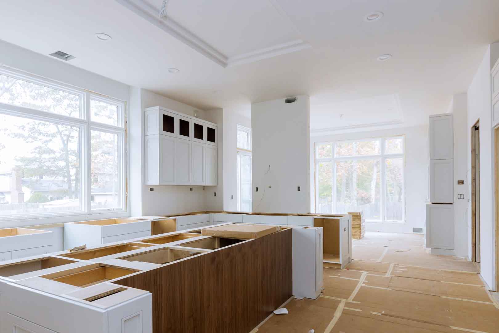 Installation,Of,Worker,Installs,To,Home,Improvement,Kitchen,Cabinet.